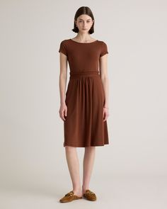 Fitted where you want it, flowy where it feels good. Our Tencel Jersey Ruched Waist Dress is the one-and-done outfit you’ll go to season after season. Eco-cool and all-day comfy, it’s as soft as it is sustainable, and it’s part of our growing knit-dress collection. With hidden side pockets for extra functionality, you’ll definitely say yes to this dress.  | Quince | Women's Tencel Jersey Ruched Waist Dress in Brown, Size XL Casual Flowy Viscose Dress, Daywear Dresses With Gathered Waist In Viscose, Daywear Viscose Dress With Gathered Waist, Viscose Dresses With Gathered Waist For Daywear, Casual Solid Midi Dress With Gathered Waist, Casual Dress With Gathered Skirt, Flowy Dress With Pleated Waist For Day Out, Flowy Skirt Dress With Pleated Waist For Day Out, Knee-length Ruched Relaxed Fit Dress