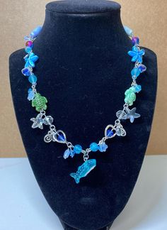 This neckless is ocean and sea creature themed! The neckless is also adjustable from the back. Adjustable Ocean-inspired Necklace, Adjustable Blue Starfish Necklace, Sea Creature, Whale Shark, Beaded Necklaces, Sea Creatures, Favorite Jewelry, Beauty Book, Beaded Necklace