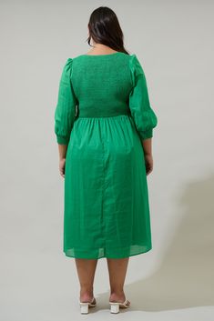 The Zelda Smocked Long Sleeve Midi Dress is a perfect piece to transition seasons and look fantastic! Long sleeves with smocked cuffs frame a smocked bodice with a v-neckline. The bottom skirt creates pleats and a flowy fit. Add on gold jewelry and matching heels or loafers. - Smocked bodice- V-neck- Puffed long sleeves- Pockets- Comes in 3 colorsSize + Fit - Model is 5'9" and wearing size 2X- Measurements taken from size 2X- Chest: 21 1/4"- Length: 51" Fabric Self: 100% Cotton, Lining: 97% Poly Puffed Long Sleeves, Puff Long Sleeves, Sleeve Midi Dress, Long Sleeve Midi, Cotton Voile, Long Sleeve Midi Dress, Sleeve Cotton, Smocking, Bodice