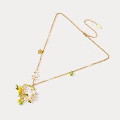 DETAILS Plating: 18K Gold Materials: 18K Gold on Brass,  Enamel Measurements: Length: 15.35 "(39cm) + Extender: 3.35"(8.5cm) Pendant Size: 1.69"*1.54"(4.3cm*3.9cm) Weight: 17.6 g Whimsical Gold Jewelry For Spring, Elegant Yellow Necklace For Spring, Whimsical Spring Gold Jewelry, Spring Whimsical Gold Jewelry, Delicate Green Jewelry For Spring, Whimsical Gold Jewelry For Summer, Gold Hoop Necklace, Lemon Garland, Sunny Vibes