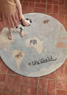 The World Rug illustrates the whole world with many wild animals. The rug in many calming colors is a great detail in the kidsroom.This new variety is made in a tufted quality like the popular Lion Rug, Koala Rug, etc.We hope that this rug will cause many great conversations about the world and how to take care of it best way possible. The rug is made of 80% wool and 20% cotton. Vacuum and spot clean only. Color: Multi Quality: 80% Wool - 20% Cotton Dimensions: Ø120 cm / Ø47 in *This item is exc Lion Rug, World Map Design, Hip Kids, Jungle Nursery, Plan Toys, Calming Colors, Arabic Food, Soothing Colors, Burke Decor