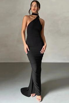 Introducing our Oblique Shoulder Backless Maxi Dress, a perfect blend of elegance and summer flair. This gown features a unique oblique shoulder design with a back strap, adding a stylish twist. The sleeveless cut and ruched detailing offer a flattering silhouette, making it ideal for summer events or special occasions. Elevate your summer wardrobe with this chic and sophisticated dress. Details: Neckline: Strapless Decoration: Backless Material: POLYESTER Material: SPANDEX Closure Type: Pullove One Shoulder Evening Dress For Summer Night Out, Stretch Backless One Shoulder Party Dress, Summer One-shoulder Dress With Asymmetrical Neckline For Prom, Stretch One Shoulder Backless Party Dress, Stretch One Shoulder Backless Dress For Party, Elegant Fitted One-shoulder Halter Dress, Evening Fitted Halter One Shoulder Dress, One Shoulder Fitted Halter Evening Dress, Formal Fitted One-shoulder Halter Dress