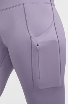 Signature Dri-FIT technology keeps you comfy and dry in second-skin leggings featuring multiple side pockets to keep small essentials secure while on the go. 27" inseam; 11" rise (size Small) Zip pocket Drop-in pockets Dri-FIT moisture-wicking technology 68% nylon, 32% elastane Machine wash, tumble dry Imported Functional Full Length Activewear With Hip Pockets, Nike Compressive Functional Bottoms, Nike Athleisure Activewear With Pockets, Nike Sporty Activewear With Side Pockets, Functional Full-length Leggings With Pockets, Functional Full Length Leggings With Pockets, Nike Activewear With Pockets For Sports, Functional Yoga Pants With Hip Pockets, Nike Nylon Yoga Activewear