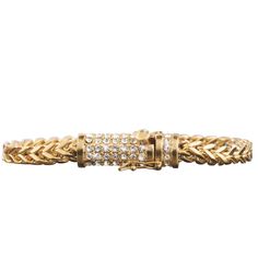 Add a hint of luxury to your jewelry collection with this stylish foxtail link bracelet. This bracelet reflects classic Italian design and precision craftsmanship. Crafted in stainless steel and finished in 18k yellow gold. The unique touch is added with the fastening of nearly 90 sparkling crystals. A real luxurious feel. Rugged Watches, Mens Jewerly, Gold Silver Jewelry, Gold And Silver Bracelets, Gold Watch Men, Classic Bracelets, Latest Jewellery, Layered Bracelets, Mens Gold