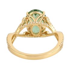 Modern style diamond and gemstone jewelry. This Ring is made of gold and diamond Gemstone material and is capable of reflecting some light to produce a natural glow. A unique feature found only in premium jewelry. This Ring is handmade in 18k Yellow Gold : 3. 673 grams , and Diamond : 0. 35 cts  Green Tourmaline: 3. 32 cts (ING-11472)  This jewelry is made by hand featuring detailed workmanship. Be careful to avoid dropping or banging as physical impacts can result in damage to the pieces includ Luxury Tourmaline Jewelry With Halo Setting, Luxury Tourmaline Rings With Halo Setting, Luxury Yellow Gold Tourmaline Emerald Ring, Luxury Tsavorite Ring With Gemstone Accents, Luxury Tourmaline Rings With Rose Cut Diamonds, Luxury Tourmaline Ring With Center Stone, Elegant Tourmaline Diamond Ring With Accent Stones, Luxury Tourmaline Emerald Ring, Luxury Emerald Ring With Moissanite And Accent Stones