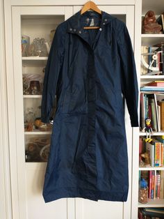 Norwegian vintage raincoat in marine blue. There is some use wear. Tellus Made in Norway Size: ca. S/XS Shoulder to shoulder: ca. 41.5 cm Armpit to armpit: ca. 54 cm Lengh: ca. 119 cm Measurements: see pictures (cm) Please check out the pictures for more information. If you want to purchase more than 1 item, please contact me first. I will adjust the postage for you. Please read this before you order! This is a vintage and second-hand item, therefore it is normal to have some traces. Please chec Navy Long Sleeve Winter Raincoat, Blue Hooded Outerwear For Rainy Season, Navy Waterproof Raincoat, Blue Weatherproof Windbreaker For Rainy Season, Weatherproof Blue Windbreaker For Rainy Season, Blue Weatherproof Raincoat For Rainy Season, Blue Rainy Season Outerwear With Pockets, Blue Waterproof Outerwear For Rainy Season, Blue Windbreaker For Fall Travel