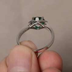 This is a gorgeous handmade creation. Its beauty is its simplicity & Elegance. The 5*7 mm oval shape faceted lab emerald is crafted in solid sterling silver and with rhodium plated. All item is sent in a beautiful gift box If you have any idea of design your ring,pls contact me directly. You can realize more lovely stuff clicking the link https://www.etsy.com/shop/knightjewelry?refshopsection_shophome_leftnav Please leave the correct address and you phone number for delivering successfully. Oval Halo Ring For Promise With May Birthstone, Oval Halo Ring For May Birthstone Gifts, Oval Emerald Halo Ring For Gift, Oval Emerald Halo Ring As A Gift, Oval Emerald Ring With Halo For Promise, Oval Halo Crystal Promise Ring, Gift Emerald Ring With Oval Cabochon Halo Setting, Oval Crystal Promise Ring With Halo, Silver Oval Emerald Ring With Halo