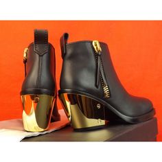 Black Leather "Sidney" Gold Heel Zip Moto Ankle Boots By Giuseppe Zanotti Made In Italy 100% Authentic,Guaranteed!!! Provocative Luxury Are What Embody The Giuseppe Zanotti Brand And These Hot Boots Will Definitely Heat Your Wardrobe. Part Action Hero/Part Glam Rock, This Leather Motorcycle Boot With A Gold-Plated Heel Has The Power To Stop Traffic Color: Black Leather Upper Square Toe Silhouette Gold Tone Side Zipper Gold Tone Zip Closure Leather Lining Leather Sole 3" Gold Tone Metal Plated He Motorcycle Boot, Leather Motorcycle Boots, Action Hero, Fur Ankle Boots, Grey Suede Boots, Grey Ankle Boots, Black Suede Ankle Boots, Hot Boots, Leopard Heels