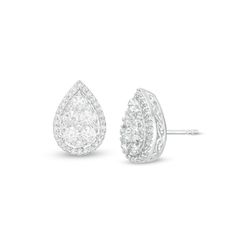 Sparkling with anytime appeal, these diamond stud earrings are a must-have for her jewelry wardrobe. Fashioned in 14K white gold, each sumptuous earring showcases a pear-shaped composite of diamonds - the largest two being 1/15 ct. each - wrapped in a frame of dainty diamonds. Captivating with 1 ct. t.w. of diamonds and a bright polished shine, these post earrings secure comfortably with friction backs. Pear-shaped Diamond Earrings In White Gold, Fine Jewelry White Pear Diamond Earrings, Pear-shaped Diamond Cut White Gold Earrings, Pear-shaped White Gold Diamond Earrings With Accents, Pear-shaped White Diamond Earrings, Classic Diamond Cluster Earrings, Pear-shaped, Classic Diamond Cluster Earrings Pear-shaped, Fine Jewelry White Gold Pear Diamond Earrings, Fine Jewelry Pear Shaped White Gold Diamond Earrings