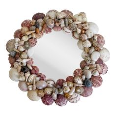 a mirror that has shells around it