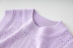 Adira Purple Knit Crop Top Captivating lilac-coloured women's knitted ribbed top with an artistic pattern. Round neck and sleeveless design with a ribbed neckline and armholes for versatility and functionality. High-quality double lycra ice silk fabric for a cooling feel and superbly soft skin comfort. Premium quality product guarantees durability and longevity for all-day wear. Perfect addition to your wardrobe for any occasion that offers the best of style, comfort, and quality. Size : (Measur Sleep Clothes, Purple Knit, Summer Wardrobe Essentials, Open Neck, Cocktail Attire, Swimming Outfit, Glitter Dress, Work Tops, Ribbed Top