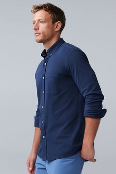 Looks like a button up, feels like anything but. With its light and stretchy texture, this shirt has all the style of a traditional Oxford—and none of the stiffness. Mack Weldon offers the best and most comfortable premium clothing for anything from working out to casual living. Our incredibly soft and smooth fabric will change your outlook on men's clothing. Come see why we are the one of the top luxury comfort clothing brands | SILVER Pique Button Up in Chambray, Size: XL | Mack Weldon Classic Solid Color Shirt For Casual Gatherings, Fitted Long Sleeve Dress Shirt For Everyday, Casual Fitted Dress Shirt For Everyday, Comfort Clothing, Clothing Brands, Button Up Shirt, Sweater Shop, Chambray, Men's Clothing