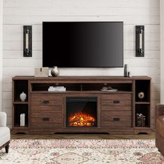 a living room with a television and fireplace