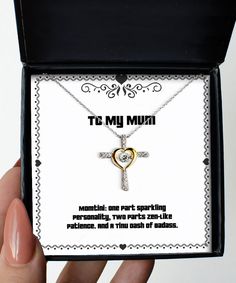 A message from the heart! This Mum Cross Dancing piece features .925 sterling silver and is sure to make your loved ones smile with its charm when it arrives gift-ready in our lovely custom packaging! As an added bonus, we include exclusive cards you can proudly display on your shelf or give away as a thoughtful present; these messages express exactly how much you care about each person. Product Features - THE PERFECT GIFT - Our jewelry is a premium-quality gift for Mum. Send it to that special someone as a perfect way to express your love - HIGH QUALITY - This Cross Dancing Pendant Necklace is made of .925 sterling silver. It has a flower shaped with AAAA grade cubic zirconia jewels and petals triple plated in 14K gold. - ADJUSTABLE - The chain is 15.75 inches long and has an adjustable e Dancing Pendant, Mum Gifts, Dance Necklace, Cheap Christmas, Gift For Mum, Wedding Jewellery Necklace, Christmas Cross, Custom Packaging, Message Card