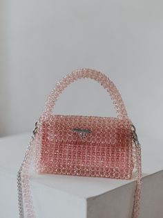 Luxury Pink Crystal Handbag Elevate your ensemble with our stunning Luxury Pink Crystal Beaded Bag, meticulously crafted to add a touch of sophistication to any outfit. Handmade with care and attention to detail, this exquisite bag exudes luxury and charm. With its compact yet spacious design, this versatile bag is perfect for carrying your essentials in style. Whether you're attending a wedding, cocktail party, or evening soirée, this statement accessory is sure to turn heads and garner complim Sparkle Purse, Prom Bag, Crystal Handbag, Wedding Cocktail Party, Unique Handbag, Party Clutch, Wedding Cocktail, Beaded Bag, Beaded Bags