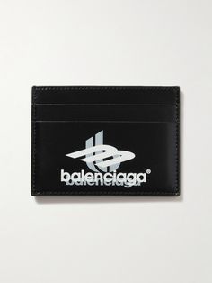 Balenciaga continues to borrow from popular culture, this cardholder is made from smooth leather and printed with a logo inspired by retro gaming. It has four card slots and an additional compartment for bills or receipts. Classic Business Card Holder With Logo, Black Leather Card Holder With Embossed Logo, Black Leather Wallet With Engraved Logo, Black Leather Wallets With Engraved Logo, Black Leather Card Holder With Engraved Logo, Modern Leather Card Holder With Embossed Logo, Modern Leather Card Holder With Logo, Black Luxury Card Holder With Engraved Logo, Luxury Black Card Holder With Engraved Logo