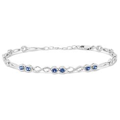 Colorful and sparkling  this beautiful bracelet features traditional blue natural sapphires and infinity links with natural diamond pavé. It’s crafted in bright 14-karat white gold with a secure lobster clasp and an adjustable fit. Blue Sapphire Diamond Bracelet, Blue Sapphire Diamond, Natural Sapphire, Sapphire Diamond, Pretty Jewellery, Pave Diamonds, Infinity Bracelet, Beautiful Bracelet, Blue Sapphire