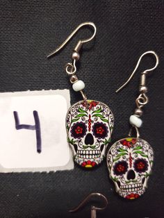 HANDMADE SUGAR SUGAR EARRINGS set 4 --choose from #1-9 and that exact one you will receive :) If you would like many please message us :) DETAIL IS AMAZING! NOT ONE IS THE SAME! COOLER IN PERSON! Set 4 Bohemian Skull Earrings For Gifts, Halloween Skull Jewelry For Jewelry Making, Halloween Skull-shaped Jewelry For Jewelry Making, Halloween Jewelry Making Skull Beads, Nickel Free Skull Jewelry For Day Of The Dead, Nickel-free Skull Jewelry For Day Of The Dead, Halloween Skull-shaped Jewelry Making Supplies, Halloween Skull Jewelry With Skull Print, Multicolor Halloween Earrings For Gift