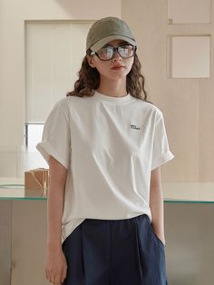 Introducing the Navy Classics Tee, the perfect addition to any wardrobe. With its young and simple design, this tee offers a comfortable yet crisp and firm feel. Its slightly loose fit makes it perfect to pair with any casual bottoms. Elevate your style and comfort with this versatile tee.ᴄᴏᴍᴘᴏꜱɪᴛɪᴏɴ100% Cottonꜱɪᴢᴇ ᴀɴᴅ ꜰɪᴛFit Type: FittedFabric Thickness: RegularFabric Stretch: High ᴘʀᴏᴅᴜᴄᴛ ꜱɪᴢᴇ Shoulder Width 16.5 in Bust 39.3 in Length 24.4 in Sleeve Length 8.2 in * Measurements are not exact. May have 1-3cm difference. Simple Summer T-shirt For Casual Gatherings, Basic Everyday T-shirt For Spring, Simple Relaxed Fit T-shirt For Everyday, Casual Cotton T-shirt For Gatherings, Relaxed Cotton T-shirt For Spring, Simple Cotton Tops For Streetwear, Simple Cotton Tops For Casual Gatherings, Relaxed Letter Print T-shirt For Everyday, Basic White T-shirt For Casual Gatherings