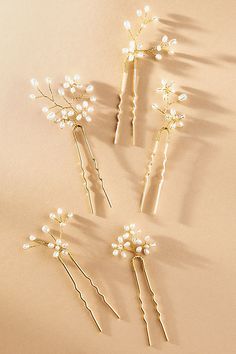 The Twigs & Honey Baby's Breath Freshwater Pearl Hair Pins beautifully combine the delicate charm of baby's breath with the elegance of freshwater pearls. | Baby's Breath Freshwater Pearl Hair Pins, Set of 5 by Twigs & Honey in Gold, Women's, Gold/Plated Brass/Freshwater Pearl at Anthropologie Sheer Wedding Dress, Baby S Breath, Pearl Hair Pins, Pearl Hair Clip, Baby's Breath, Fall Fits, Pearl Hair, Wedding Shop, Fresh Water