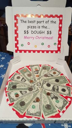 a pizza box with money in it and a sign that says the best part of the pizza is the $ 8 00 merry christmas