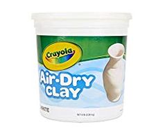 a tub of air dry clay on a white background