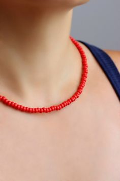 Bright minimalist beaded choker with red czech glass beads, strong double nylon thread, silver tone clasps, silver tone lobster clasp and stainless steel adjustable length chain. Perfect for everyday wear or a pretty gift for someone special! You can wearing it with other chokers, chain necklaces or alone! Total length of necklace is 43 cm or 16.9 inches and 4,5 cm of adjustable length chain. NOTE: in my store you can also find similar necklaces in other colors as in the last photo. The price is Adjustable Red Choker With Tiny Beads, Adjustable Red Beaded Necklace With Lobster Clasp, Red Minimalist Beaded Necklace With Tiny Beads, Minimalist Red Beaded Necklace With Tiny Beads, Minimalist Red Beaded Necklaces, Red Minimalist Beaded Necklace, Minimalist Red Beaded Necklace, Red Beads For Beach And Summer, Red Beaded Necklaces For Summer