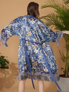 Crafted with meticulous attention to detail, our kimono robe embodies the essence of Eastern luxury, offering you a truly indulgent experience every time you slip it on. Its versatile design effortlessly transitions from leisurely mornings to elegant evenings, ensuring you stay elegant and refined throughout the day. • Silky Comfort: Made of high-quality polyester charmeuse, our robes are soft, lightweight and cooling for summer. They have a smooth and breathable texture that feels just like nat Elegant Beach Robe With Kimono Sleeves, Elegant Silk Beach Robe, Elegant Silk Robe For The Beach, Elegant Kimono Sleeve Robe For Vacation, Elegant Vacation Robe With Kimono Sleeves, Elegant Robe With Kimono Sleeves For Vacation, Elegant Floral Print Beach Kimono, Elegant Beach Kimono With Floral Print, Silk Dressing Gown