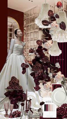 a woman in a wedding dress standing next to a table filled with flowers and candles