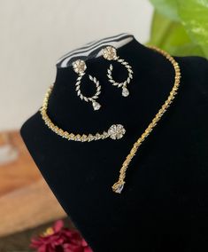 -Fall in love with this simple gold finished CZ AD necklace and earrings jewelry set! -Will suit very well for ethnic dresses for parties, weddings, and gatherings! Earrings measurements: -------------------------- Height: 4 cm Width : 2 cm  Care Instruction : Avoid Heat & Chemicals Like Perfume, Deo, Alchol, Etc. | Clean With Dry Cotton Cloth | Pack In An Air Tight Container After Use Necklace Set Gold, Ethnic Dresses, Indian Necklace, Bollywood Style, Necklace Sets, Gold Necklace Set, Ethnic Dress, Jewelry Maker, Bollywood Fashion