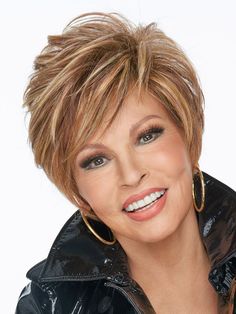 ALL SALES FINAL ON CLEARANCE ITEMS  LIMITED QUANTITIES AVAILABLE On Your Game Partial Monofilament Wig by Raquel Welch is a whether brushed smooth and sleek or finger styled for a piecey look, this contemporary short style includes a sculpted back for a stunning profile and shorter waved layers in the crown for fullness and texture. The slightly asymmetrical razor cut fringe adds an air of sophistication while the Sheer Indulgence lace front monofilament part affords added styling options. Wilshire Wigs, Raquel Welch Wigs, Wig Outlet, Best Wig Outlet, Wig Companies, Monofilament Wigs, Best Wigs, Raquel Welch, Bob Haircuts