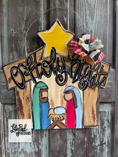 a nativity scene is hanging on a door with the word stencils night