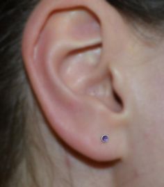 ⋙ Sterling Silver amethyst tragus stud earring. ⋙ This listing is for one stud earring. ⋙ Available gauges for the stud: 20g; 18g; 16g. ⋙ Please note: the less gauge number, the thicker stud is. ⋙ Available gemstones: ruby; lapis lazuli; black onyx; emerald; light blue opal; garnet; white opal; kiwi green opal; amethyst; aqua blue cz; clear cz; black-red opal; turquoise; blue sapphire ⋙ Here are available post shapes: L Shape; Left Screw (for left nostril); Right Screw (for right nostril); Post Opal Nose Stud, Gold Nose Stud, Tragus Stud, Tragus Earring, Red Opal, Nose Piercing Jewelry, Silver Nose Ring, Cartilage Stud, Tragus Earrings