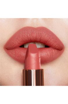 What it is: A rosebud-pink matte-finish lipstick with a long-lasting, buildable, hydrating formula.What it does: These dreamy, nuanced, rosebud shades help you look like the most beautiful version of you. The lipstick features 3D glow pigments that help lips appear wider and fuller, and its matte formula is enriched with Charlotte's secret ingredient and orchid extract to protect and soothe, delivering a cashmere-like finish. Its unique square-angled tip mimics the shape of a lip brush for preci Charlotte Tilbury Looks, Revolution Lipstick, Charlotte Tilbury Matte Revolution, The Look Of Love, Look Of Love, Shop Makeup, Lip Hydration, Long Lasting Lipstick, Eye Makeup Art