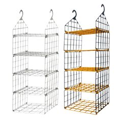 three different types of bird cages hanging on hooks