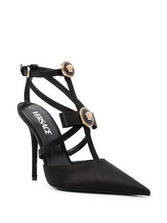 Archival motifs are a mainstay of Versace's high-octane aesthetic – take these black Gianni Ribbon pumps as an example. Crafted from lustrous satin to a sharp silhouette with a pointed toe and stiletto heel, they are adorned with cage-inspired 'nastro Gianni' bows punctuated by Medusa '95 hardware. Plat Form Shoes, Versace Pumps, Versace Heels, Versace Sandals, Gold High Heels, Chanel Camellia, Pink Pumps, Satin Pumps, Party Shoes