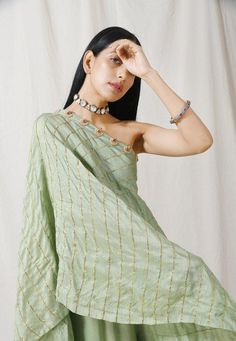 Sage Green One Shoulder Tunic/Palazzo Set of 2 - Trendroots Green Summer Saree With Zari Work, Green Palazzo Set For Summer Festive Occasions, Green Saree With Zari Work For Summer, Green Zari Work Saree For Summer, Summer Festive Green Palazzo Set, Green Palazzo Set With Resham Embroidery For Summer, Green One-shoulder Blouse, One-shoulder Green Blouse For Spring, Green One-shoulder Blouse For Spring