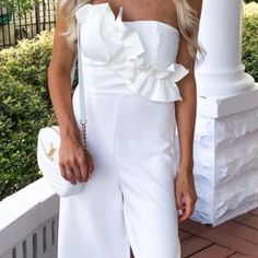 Size Small White Jumpsuit. Nwt. Fitted One-shoulder Jumpsuit With Ruffles, One-shoulder Fitted Jumpsuit With Ruffles, Fitted One-shoulder Ruffled Jumpsuit, Elegant Strapless Jumpsuits And Rompers For Day Out, White Chic Jumpsuits And Rompers For Brunch, Chic White Jumpsuits And Rompers For Brunch, White Strapless Jumpsuits And Rompers For Day Out, Fitted One-shoulder Jumpsuit For Spring, White Strapless Jumpsuit For Day Out