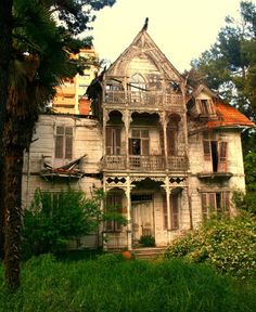 an old, run down house in the woods