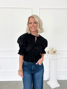 Elevate your wardrobe with our Always Stand Out Black Eyelet Blouse! This trendy top boasts a bow closure down the front, peplum style, and puff sleeves, perfect for effortlessly transitioning from day to night. Say yes to versatile and stylish fashion with this blouse, perfect for your 9 to 5 job and happy hour with the girls! The eyelet detail dresses this blouse up with the most girly of details! Puff sleeves Peplum style Bow tie closure on the first tie, the rest are decoration and there are Chic Peplum Top For Date Night, Trendy Blouse With Blouson Sleeves For Night Out, Night Out Puff Sleeve Blouse, Spring Puff Sleeve Top For Night Out, Chic Peplum Top For Night Out, Spring Chic Peplum Top For Night Out, Feminine Puff Sleeve Tops For Night Out, Chic Peplum Top For Night Out In Spring, Spring Night Out Puff Sleeve Tops