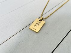 This handmade personalized pendant necklace is for everyday wear. It is also a perfect gift for your loved ones on occasions like Christmas, valentines day, mothers day, fathers day, birthday, anniversary or graduation day!. Pendant: Length: 21.9mm Width: 14.9mm Thickness: 1.9mm Features:- Chain Type: Box Chain  Material: 18K Gold PVD Plated 316L Stainless Steel Color: Gold Personalized Engravable Gift Box (OPTIONAL) This Gold Pendant Necklace can be customized with your own length; it can be en Handmade Gold Jewelry For Father's Day, Personalized Square Pendant Charm Necklace As Gift, Minimalist Dog Tag Necklace For Gift, Personalized Rectangular Charm Necklaces For Anniversary, Personalized Rectangular Charm Necklace For Anniversary, Handmade Charm Necklaces With Rectangular Pendant For Gift, Handmade Charm Necklace With Rectangular Pendant As Gift, Father's Day Gift Pendant Charm Necklace, Square Pendant Necklace For Mother's Day Gift