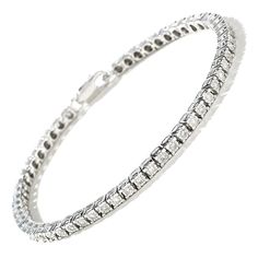 3/4 CT. T.W. Diamond Tennis Bracelet in Sterling Silver White Diamond-accented Tennis Bracelet As Gift, Elegant Silver Tarnish-resistant Tennis Bracelet, Luxury White Gold Tarnish-resistant Tennis Bracelet, Luxury Silver Tarnish-resistant Tennis Bracelet, Silver Tarnish-resistant Cubic Zirconia Tennis Bracelet, Peoples Jewellers, Tennis Bracelet Diamond, Cz Diamond, Tennis Bracelet