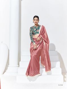 Organza Tissue Silk Saree with blouse in Peach and Teal 2139 Desc:  Color : Peach and Teal ld Fabric :  organza tissue silk saree Work : Embroidery sequins Blouse work: digtal printWash Care : Dry clean Sleeve Style : Half Sleeve Long Sleeves : Done only in Custom Stitch Sleeves Lining : Done only in Custom Stitch Bust Size : 32 to 42 Inches Occasion : Wedding   Festival   Kitty Party   Sangeet   Party Wear   Engagement   Reception   Ceremonial. With Express Free Shipping and Custom Stitching, Buy Indian Party wedding and bridal Sarees Organza Tissue Silk Saree with blouse in Peach and Teal 2139 online in USA, UK and Canada from KollyBollyEthnics.com Luxury Festive Peach Blouse Piece, Pink Saree Blouse With Sheer Dupatta, Pink Blouse With Sheer Dupatta For Diwali, Pink Anarkali Blouse With Sheer Dupatta, Pink Pallu Blouse For Eid, Pink Blouse With Sheer Dupatta For Eid, Peach Blouse With Zari Work For Wedding, Peach Wedding Blouse With Zari Work, Festive Peach Blouse With Zari Work