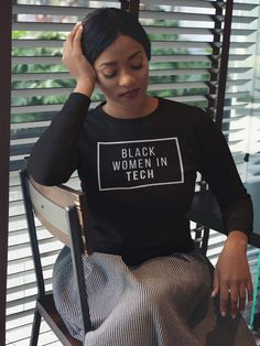 Black Women In Tech Sweatshirt- Women In Tech Sweater- Women Who Code- Software Engineer Sweatshirt- UX Designer Sweater- Steminist Sweatshirt- Steminist Sweater- She Codes Sweatshirt- Women In STEM- Woman In Tech Sweatshirt- Women In Tech Gift- Women In Tech Shirt- Boho Sweater- Minimal Sweatshirt - HBCU Gift This soft cozy women in tech sweatshirt is the perfect gift for yourself or any woman in tech you know! * ORDER INFORMATION * Ideal for any situation, a unisex heavy blend crewneck sweatshirt is pure comfort. These garments are made from polyester and cotton. This combination helps designs come out looking fresh and beautiful. The collar is ribbed knit, so it retains its shape even after washing. There are no itchy side seams on these sweaters. .: 50% Cotton 50% Polyester .: Medium-h Black Fitted Graphic Print Sweatshirt, Fitted Black Graphic Sweatshirt, Black Stretch Sweatshirt With Letter Print, Black Stretch Trendy Sweatshirt, Black Slogan Sweatshirt Crew Neck, Black Long Sleeve Sweatshirt With Text Print, Black Trendy Sweatshirt With Text Print, Fitted Black Cotton Sweatshirt, Trendy Black Sweatshirt With Text Print