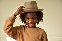 Your favorite hat, just a little smaller. From family pictures, to running errands, to play dates at the park - The Tan Galilee Rancher Kids Hat can go everywhere your fearless kids do. Style - Teardrop Rancher Material - 100% Australian Wool Hat Size - 21 inches (53 cm) Dimensions - Crown: 10 cm + Brim: 7.5 cm Casual Flat Crown Hat For Country Events, Casual Fedora With Flat Crown For Country Events, Playful Adjustable Hats For Fall, Playful Brown Hat, One Size Fits Most, Playful Brown Adjustable Hat, Rancher Hats, Aesthetic Family, Outfit For Kids, Hats For Kids