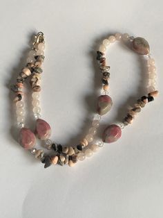 "Crystal Necklace, Pink Zebra Jasper, Rose Quartz, Rhodonite necklace.  Beautiful necklace made out of Pink Zebra Jasper,  Rhodonite and Rose Quartz an assortment of pink gemstones. All natural gemstones beads have their own unique markings and colors making this necklace truly stunning. Lobster Claw Clasp, Measures 20.5\" length. *FREE SHIPPING  *Gift box available" Pink Hand-strung Round Bead Necklaces, Pink Hand-strung Round Beads Necklace, Bohemian Pink Agate Necklace, Adjustable Pink Stone Necklace, Pink Opal Gemstone Pendant Necklace, Pink Adjustable Necklace With Stones, Adjustable Pink Necklace With Stones, Pink Stone Necklace With Adjustable Fit, Single Strand Pink Opal Necklace With Round Beads