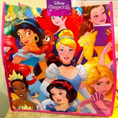 there are many princesses on the back of this bag