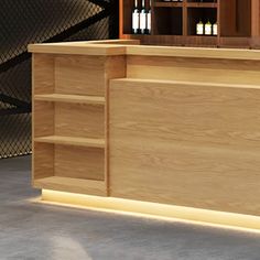 a wooden bar with shelves and bottles behind it