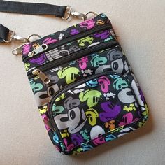 Nwot Authentic Disney Parks Crossbody. New Condition. Adjustable Strap. 7x9". Bundle 2 Or More Items For A Special Offer Plus Discounted Shipping! Fun Multicolor Bag With Character Print, Casual Black Bag With Character Print, Casual Black Bags With Character Print, Disney Cast Member, Disney Purse, Tech Pouch, Disney Bags, Brown Leather Satchel, Disney Bag