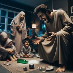 a group of people sitting on top of a floor next to each other